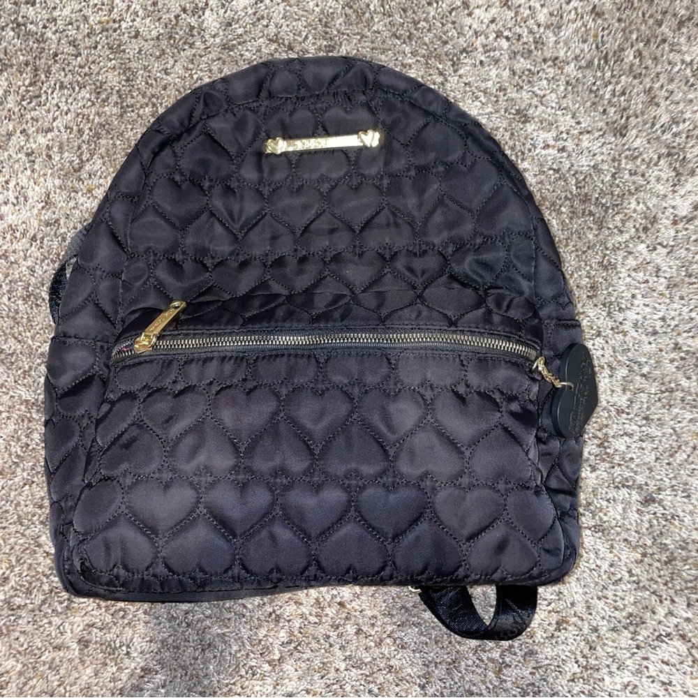 Betsey Johnson quilted heart backpack.